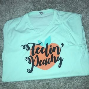 Green “feelin peachy” shirt